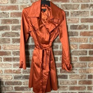 Bebe rust satin trench coat. Size S